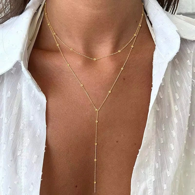 Collana Lariat Aurévia — Pendente a Y in Acciaio Dorato
